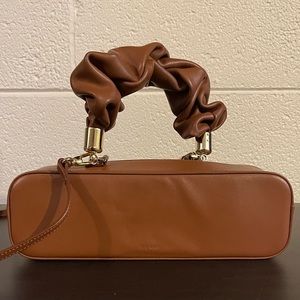 The Sant Mini Kinchaku Bag